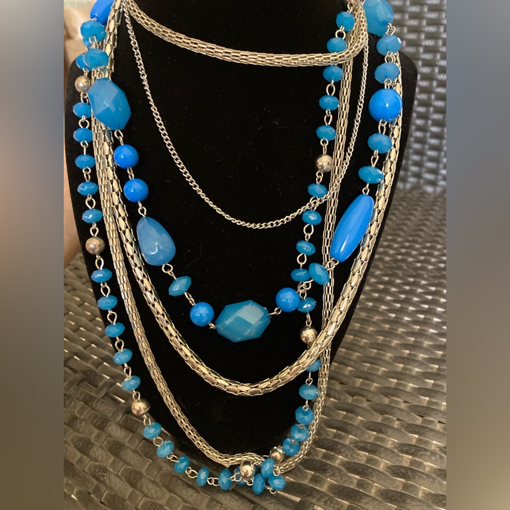 6-strand necklace. 21”- 23” when clasped.